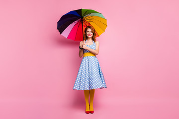 Full size photo positive sweet lovely nice lady fifties lifestyle hold bright parasol enjoy weather spring forecast weather season wear blue headband tights isolated pink color background
