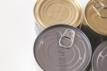Tin, canned food isolated on white. Stock and proviant concept. Long-term storage products.