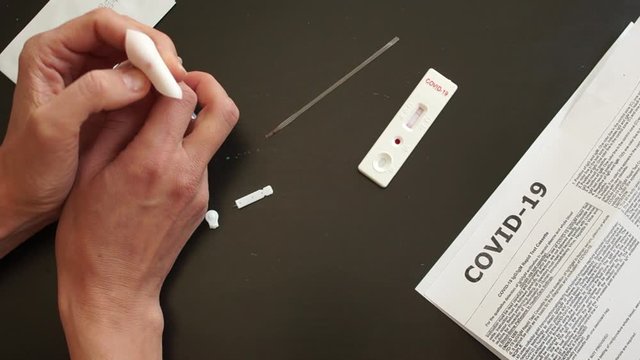 Rapid test covid 19. Test cassette and a kit of reagents for self-sampling of blood for analysis on coronovirus covid-19. Assessment of the test result. Negative test SARS-CoV-2. Part 3