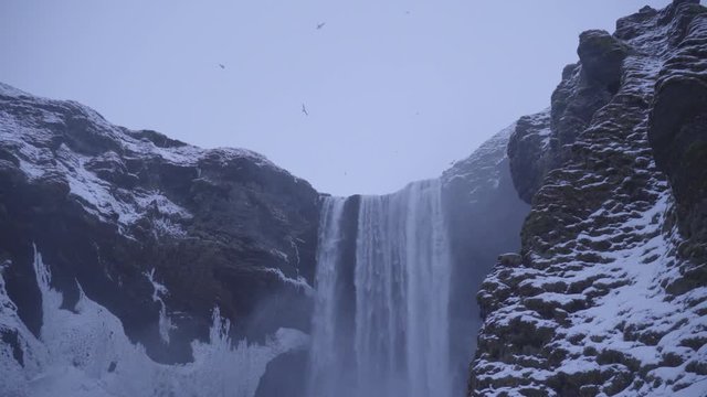 Sk&oacute;gafoss waterfall during the Icelandic winter.

