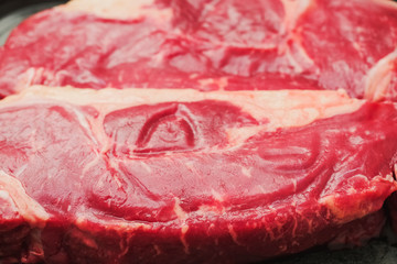 Two fresh strip loin steaks, Close up, Selective focus.
