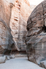 Famous pink stone curving walls of Petra, Jordan