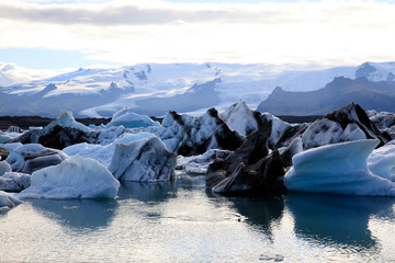 Jokulsarlon / Iceland - August 29, 2017: Ice formations and icebergs in Glacier Lagoon, Iceland,...