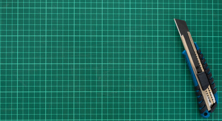 green cutter mat with stationery knife