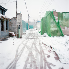 Snow on ruins.