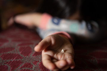 The first dropped baby teeth.