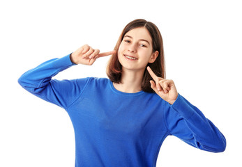 Teenage girl with dental braces on white background