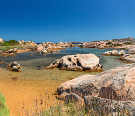 Panoramic view of the pink granite rock formations of the island of Maddalena in Sardinia, Italy.