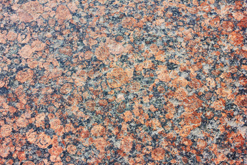 Granite mineral rock texture background. Granite stone material pattern. Rough granite surface, natural mineral stone wall close up outdoor view