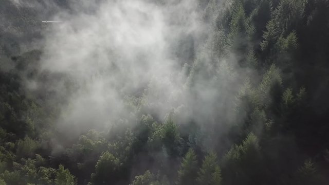 Aerial flying through clouds 4k