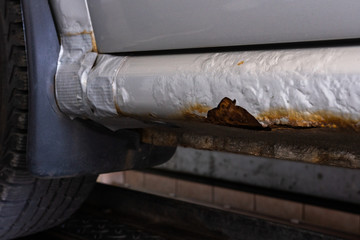Rusty wheel of a very old car