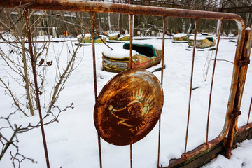 Abandoned amusement park in ghost town Prypiat. Priryat, Chornobyl exclusion zone. December 2016