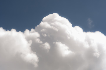 storm clouds gather in the blue sky