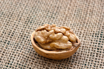 Fresh and organic walnuts on burlap