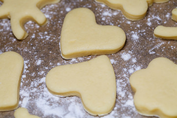 cooking homemade delicious cookies of different figures from the dough