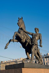 Fototapeta premium Horse tamers monument by Peter Klodt on Anichkov Bridge in Saint-Petersburg Russia. 
