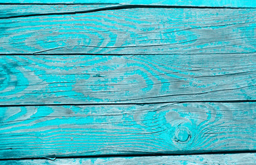 Blue, turquoise, light blue wooden background. closeup. Top view of blue painted wooden plank. Place for text. Copy space.