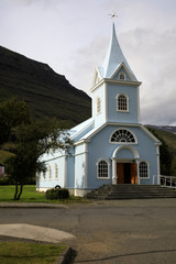 Fototapeta na wymiar Seydisfjordur / Iceland - August 29, 2017: The church in Seydisfjordur village, Iceland, Europe