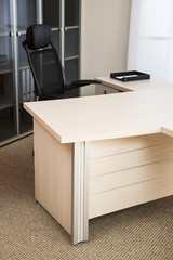 black leather armchair in modern office