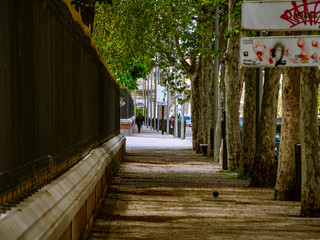 Fototapeta na wymiar Madrid / Spain-04/19/20 sidewalk outside the urban park of the good retirement of madrid. completely empty due to the covid pandemic 19.cala alcala