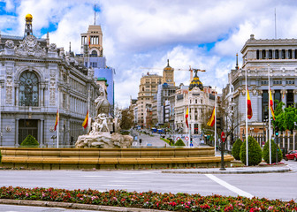 Madrid / Spain-04/19/20 Plaza de la Fuente de Cibeles in Madrid with calle de alcal&aacute; and the metropolis building in the background, empty due to the covid-19 coronavirus pandemic in 2020