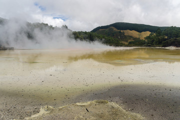 WAI-O-TAPU, NEW ZEALAND - MARCH 03, 2020: Steam clouds rising above the Champagne pool