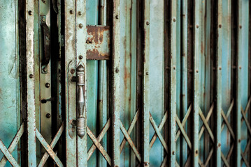Old rusted iron gate in an ancient village