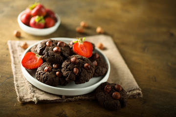 Homemade chocolate cookies with hazelnut and strawberry