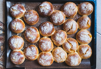 Fresh homemade buns on table