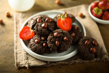 Homemade chocolate cookies with hazelnut and strawberry