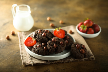 Homemade chocolate cookies with hazelnut and strawberry