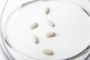 Closeup of herbal ayurvedic pills with selective focus