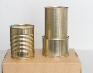 tin cans on a craft box
