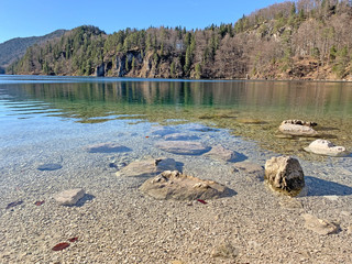 Stunning view of the Alpsee lake on a sunny day near Neuschwanstein castle. Schwangau, Bavaria, Germany