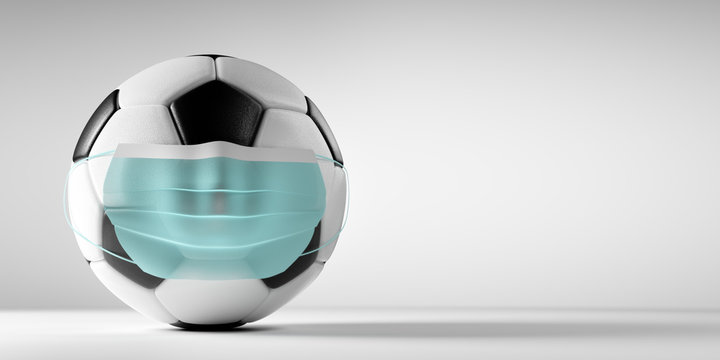 Soccer, football ball in medical mask. Sport against coronavirus COVID-19.
