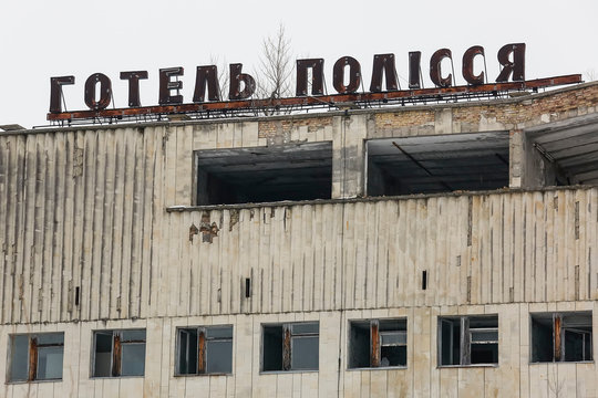 Abandoned ghost town Prypiat. Overgrown trees and collapsing buildings. Pripyat, Chornobyl exclusion zone. December 2016