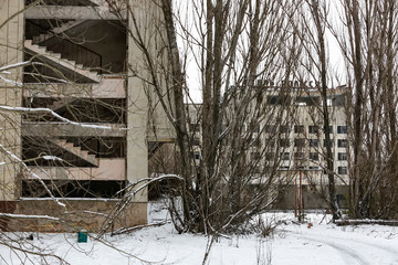 Abandoned ghost town Prypiat. Overgrown trees and collapsing buildings. Pripyat, Chornobyl...
