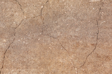 Background texture earth sand stones brown with cracks