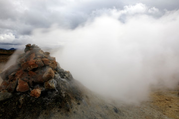 Hverir / Iceland - August 30, 2017: Hverir fumarole area near Namafjall mountain, Myvatn Lake area, Iceland, Europe