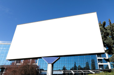 Blank billboard in city background