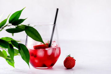 Glasses of Tasty Cranberry Cocktail with Ice Cubes on light Gray Background Alcoholic Drink Straws Horizontal Copy Space