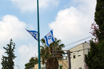 Israeli flags showing the Star of David hanging proudly for Israel's Independence Day (Yom Haatzmaut)