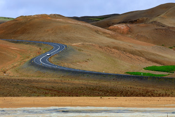 Hverir / Iceland - August 30, 2017: The road to Hverir area near Namafjall mountain, Myvatn Lake area, Iceland, Europe