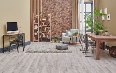 Decorative brown interior room, wooden bookcase background, grey armchair, coffee table and parquet detail.