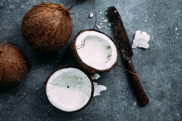 Fototapeta na wymiar Coconuts on concrete gray background close-up