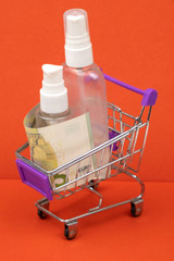 full trolley of antiseptics on a red background