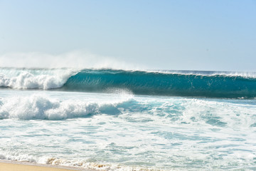 wave breaking on the beach Banzai Pipeline Hawaii