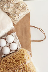 flour and eggs on wooden table