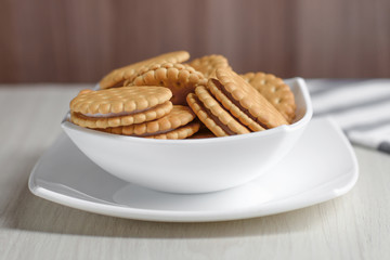 Sandwich cookies in a square white plate