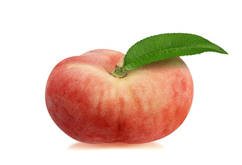Chinese flat donut peaches with leaf isolated on white with clipping path